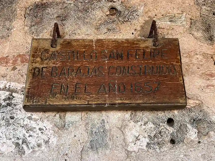 Wooden plaque inside Castillo San Felipe de Barajas marking its construction date of 1657 in Cartagena de Indias
