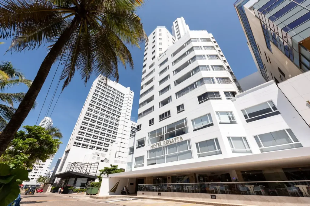 White exterior facade of Hotel Regatta in the beachfront area of Bocagrande, Cartagena.