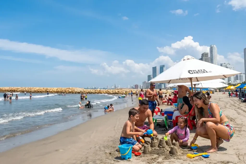 Familia construyendo un castillo de arena en la playa de Bocagrande, uno de los mejores planes de día en Cartagena.